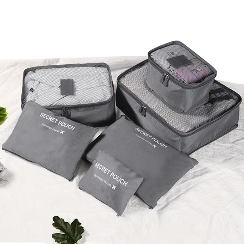 Voyagez Sereinement : Le Kit d'Organisation Ultime pour une Valise Parfaitement Rangée.