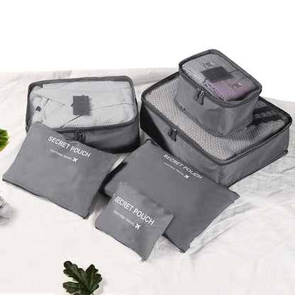 Voyagez Sereinement : Le Kit d'Organisation Ultime pour une Valise Parfaitement Rangée.