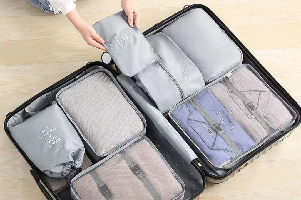 Voyagez Sereinement : Le Kit d'Organisation Ultime pour une Valise Parfaitement Rangée.